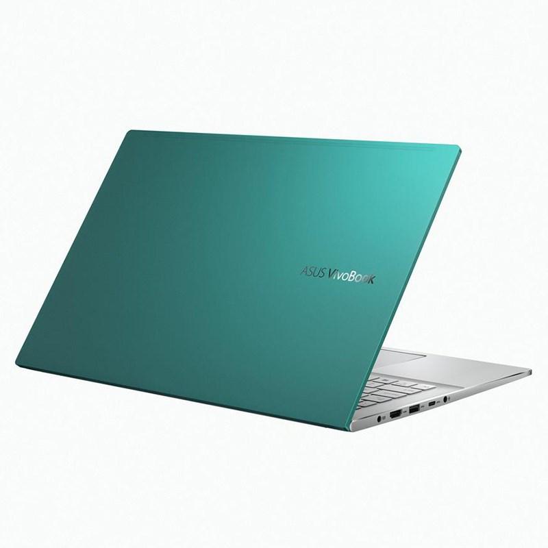 Asus VivoBook S15 laptop in Gaia Green color with a 15.6-inch FHD display, showcasing its sleek design and backlit keyboard.